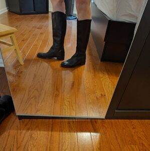 Black Leather new condition Knee-High Boots. Purchased in Spain.  size 10-10.5